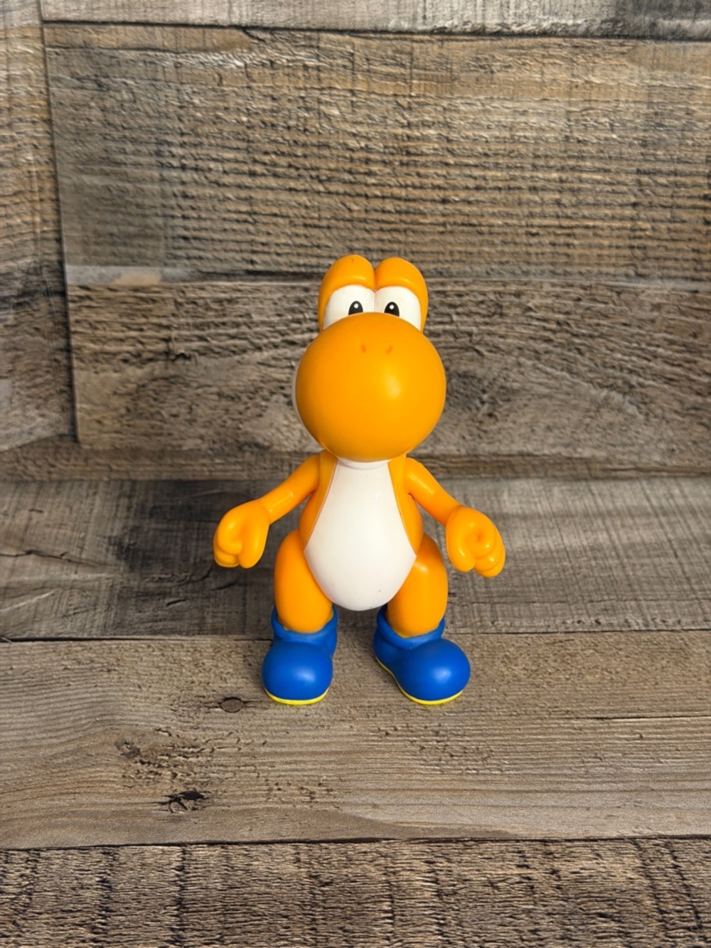 Orange Yoshi figure from Super Mario Bros.